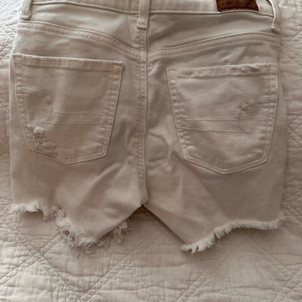American Eagle Outfitters Cream Distressed Jean Shorts